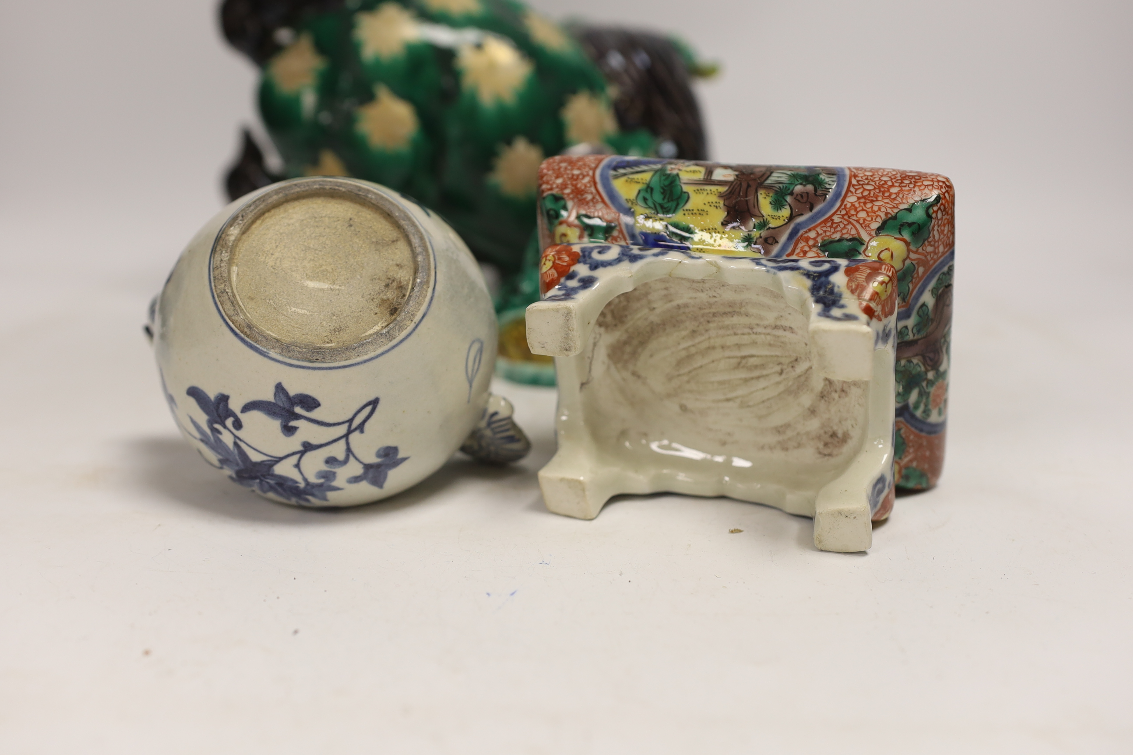 A Japanese Dog of Fo, a box and cover figure and blue and white pourer, Dog of Fo, 25cm high